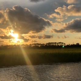 clouds in the sky over a body of water