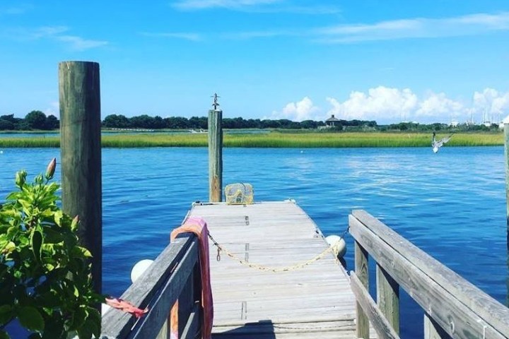 a wooden boat in a body of water